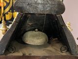 an old clock that is on display in a room