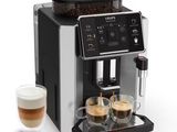 gros plan d'une machine à café avec deux tasses de café