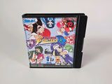 un gros plan sur un boîtier de jeu vidéo posé sur une surface blanche