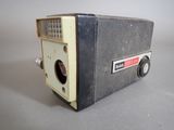 an old camera that is sitting on a table
