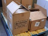 many boxes on a pallet in a warehouse