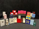 a lot of different types of perfumes on the table