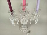 three candles that are sitting on a table