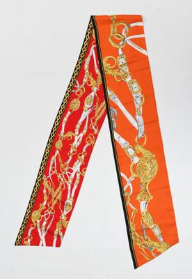 two ties that are on a white surface