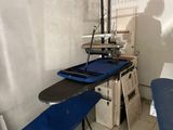 a room with a table and a chair in it