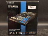 a box of yamaha mg10xuf analog mixing console