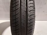 a close up of a tire on a white surface