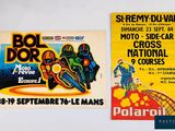 two posters on the wall of a motorcycle show