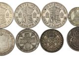 un lot de six pièces d'argent présentant des motifs différents