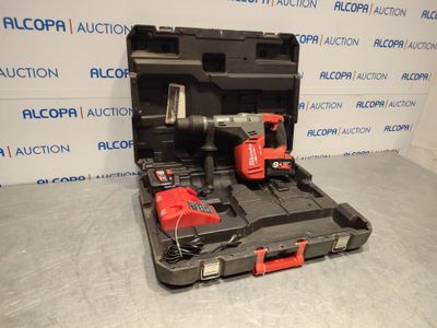 a couple of tools are sitting in a case on the floor