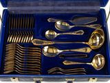 a blue case with silverware in it on a white background