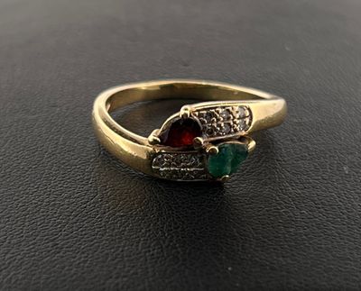 Bague or jaune 750 millièmes ornée d'une émeraude et d'un grenat de ta - Photo 1
