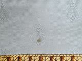 a close up of a piece of fabric with a design on it