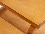 two wooden tables sitting side by side on a white surface