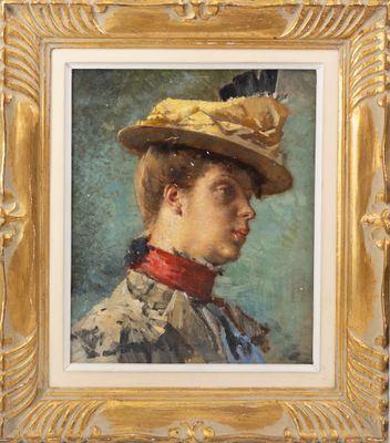 portrait d'une femme portant un chapeau de paille et un foulard rouge