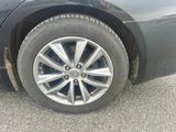 a close up of a tire on a car ' s rim