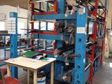 an image of a room filled with lots of machines and a table