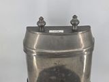 a metal container that has a lid on it