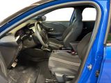 the interior of a blue car with the door open and the driver seat down