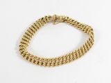 a gold chain bracelet with a clasp on a white background