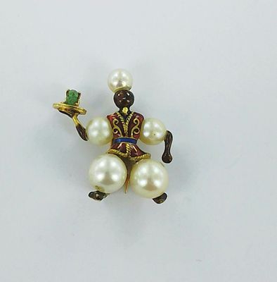 a small figurine of a man holding a tray of food