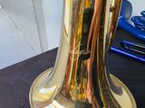 a brass instrument that is sitting on a table