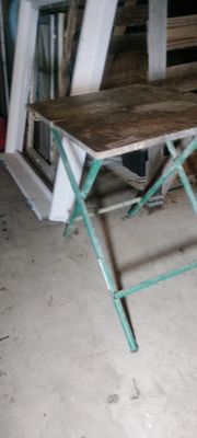 an image of a small table in a garage