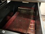 an open oven with a lot of food inside of it
