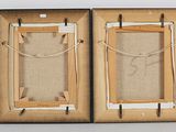 two wooden frames that have a picture in them