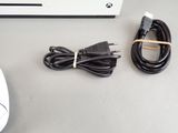 a computer mouse and a cable connected to a computer mouse