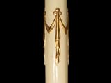 a white vase with a gold decoration on it