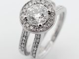 a close up view of a diamond ring with two bands