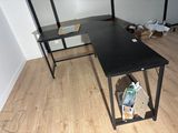 an image of a desk with a computer on top of it