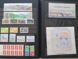 a black folder with a lot of stamps on it