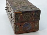 a wooden box with a picture of a man on it
