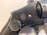 a close up of a gun on a table
