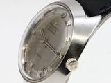 a close up of a wrist watch with a black strap