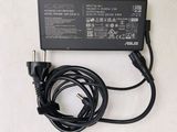 a charger that is attached to a laptop