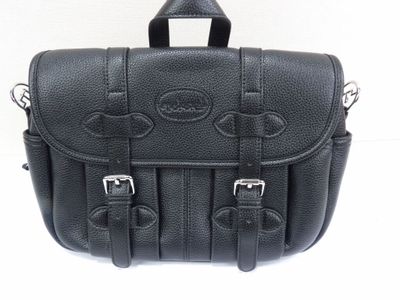 a black leather bag with two buckles on it