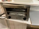 an image of a toaster oven in a kitchen