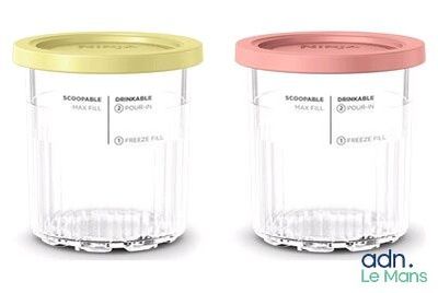 two blenders that are sitting side by side next to each other
