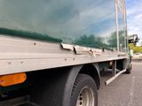 a truck that is parked on the side of the road