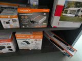 many boxes of electronic gadgets on the shelf