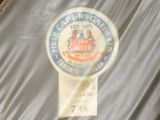 an image of a black jacket with a label on it
