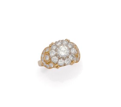 a diamond cluster ring, by van cleef