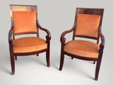 two chairs with orange upholstered upholstered upholstered upholstered upholstered upholstered upholstered upholstered