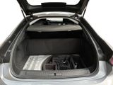 a trunk of a car with a bunch of electronics in it