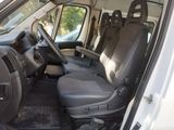 a white van with black seats in the back of it
