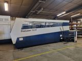 a close up of a machine that is in a warehouse