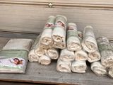 many rolls of toilet paper sitting on a table